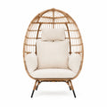 Rattan-Sessel Ei-Form mit Stahlrahmen und beigen Kissen